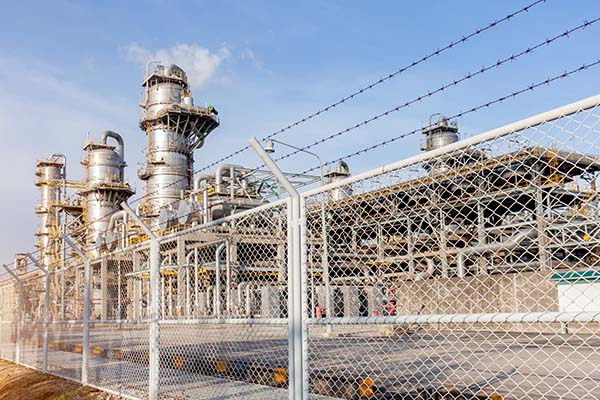 Fence along chemical plant