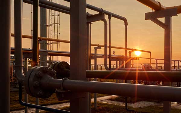 Natural gas processing plant during sunset