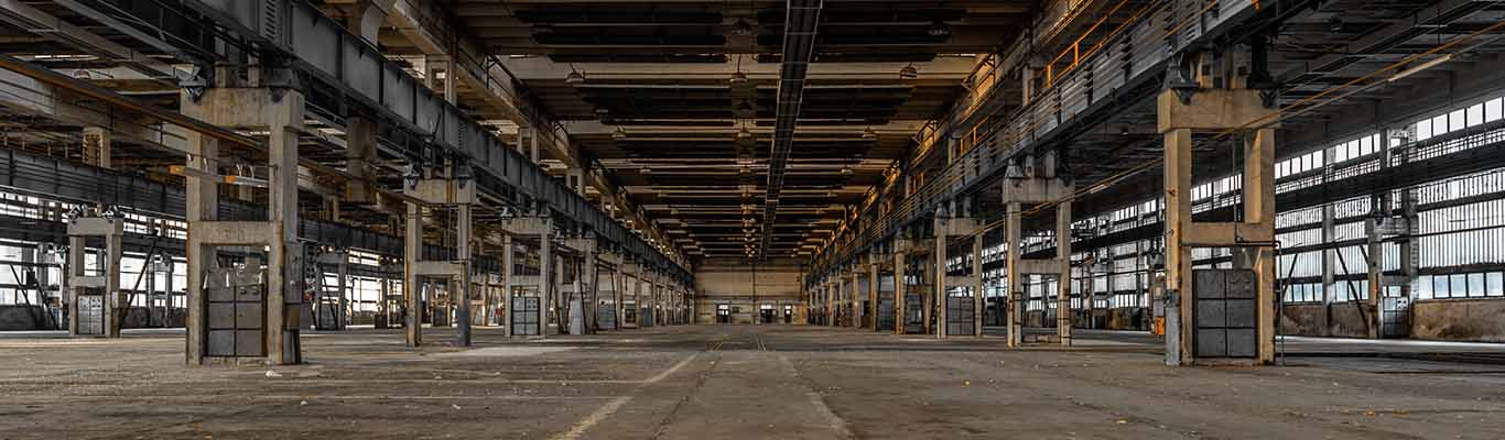 An abandoned industrial warehouse floor