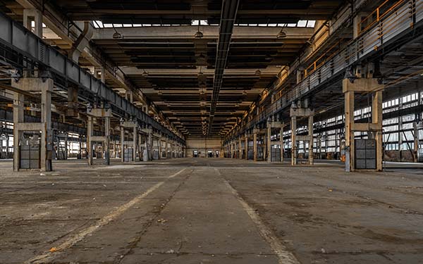 An abandoned industrial warehouse floor