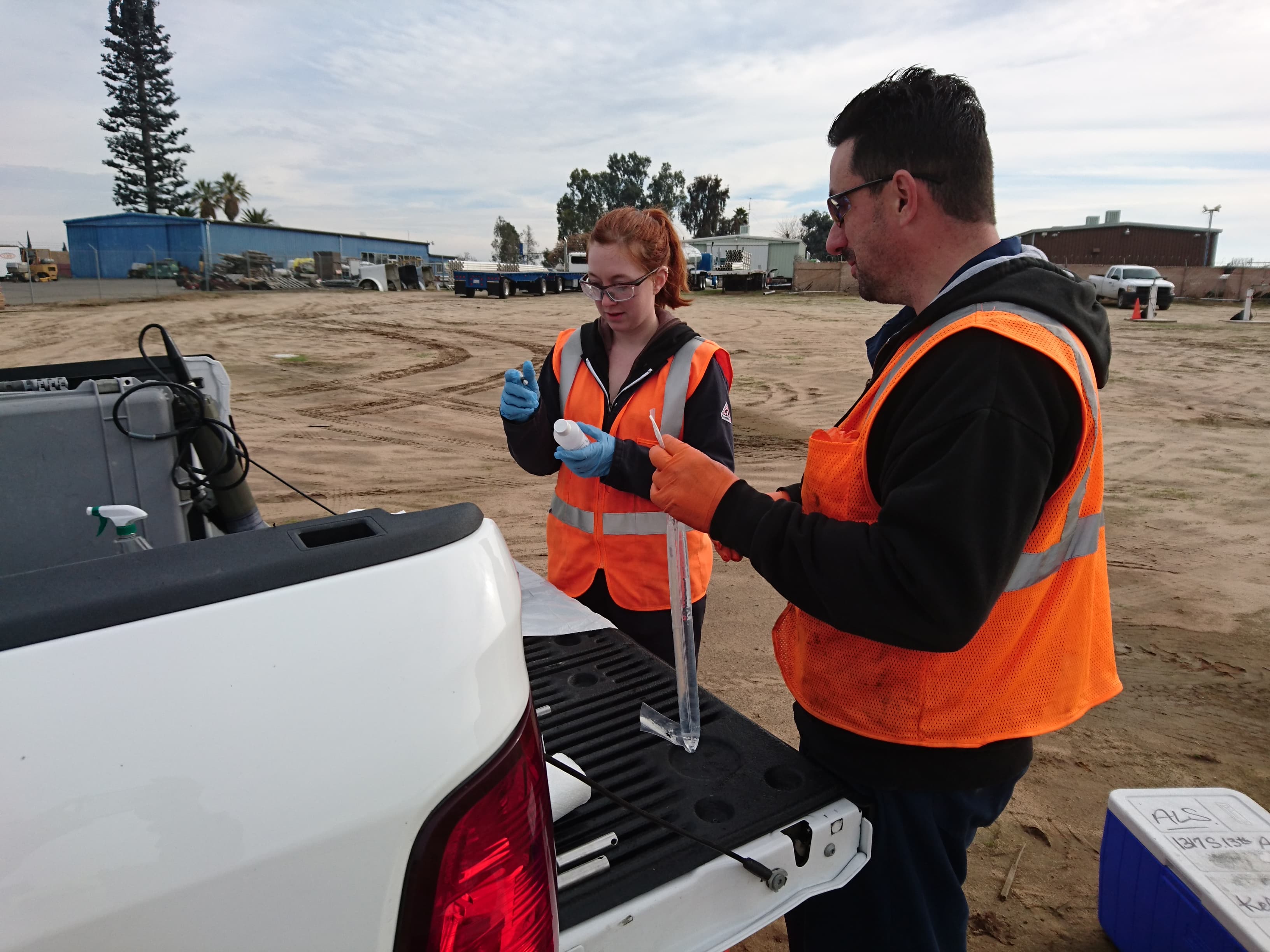 two people groundwater sampling