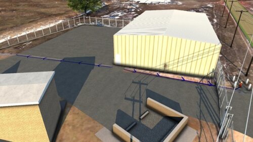 A 3D model depicting the stormwater drainage away from a proposed metal building was created in early project stages to visualize plans for routing stormwater away from critical infrastructure.